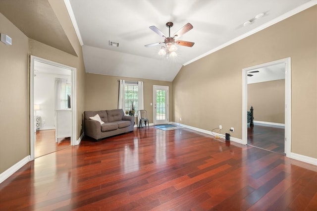 1204 NW 190th Pl, Edmond, OK 73012 - living area with wood finished floors, a ceiling fan, vaulted ceiling, and crown molding