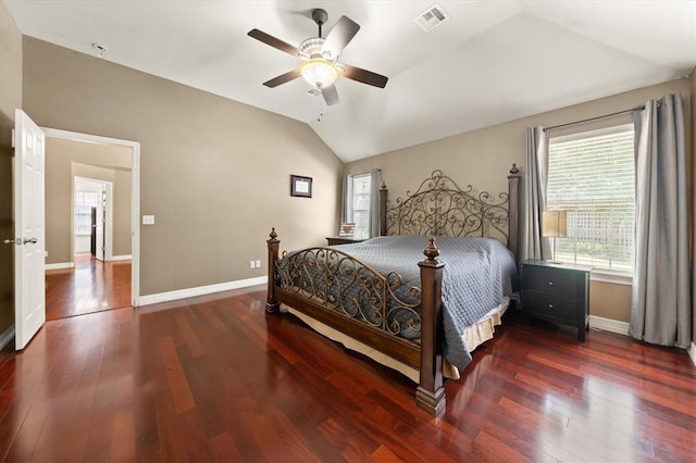 1204 NW 190th Pl, Edmond, OK 73012 - bedroom with vaulted ceiling, wood finished floors, and ceiling fan