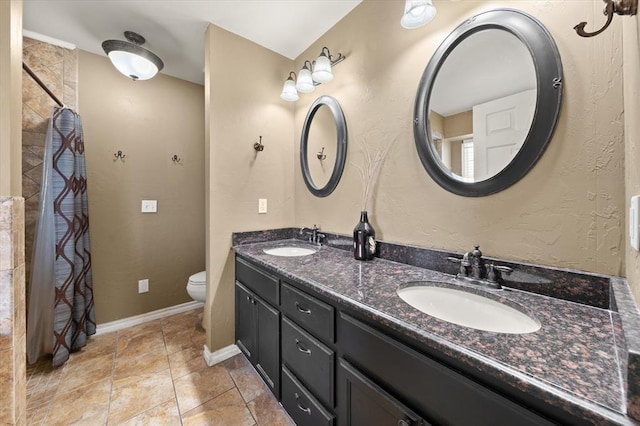 1204 NW 190th Pl, Edmond, OK 73012 - bathroom with double vanity and a shower with curtain
