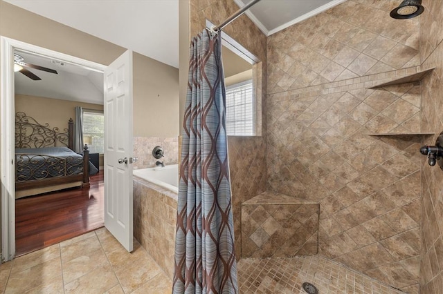 1204 NW 190th Pl, Edmond, OK 73012 - ensuite bathroom featuring a tile shower, ceiling fan, and tile patterned floors