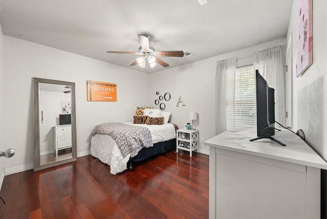 1204 NW 190th Pl, Edmond, OK 73012 - bedroom with wood finished floors and a ceiling fan