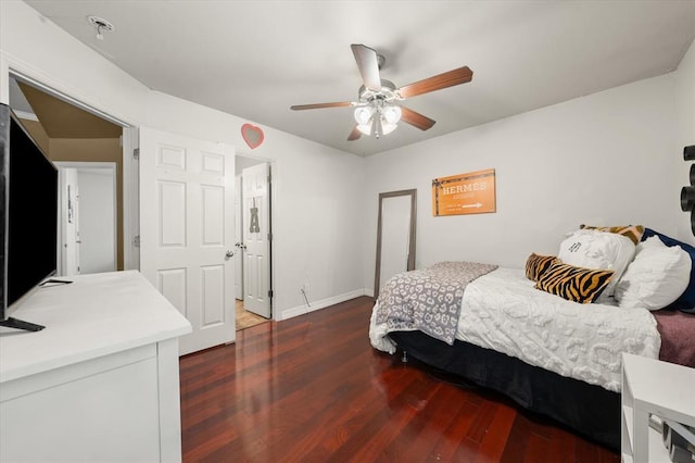 1204 NW 190th Pl, Edmond, OK 73012 - bedroom featuring wood finished floors and ceiling fan