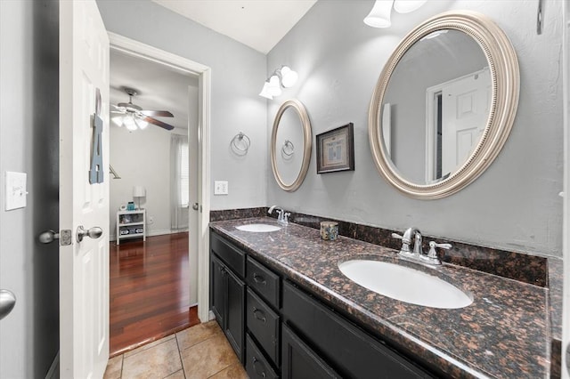 1204 NW 190th Pl, Edmond, OK 73012 - full bath featuring double vanity, tile patterned floors, and a ceiling fan