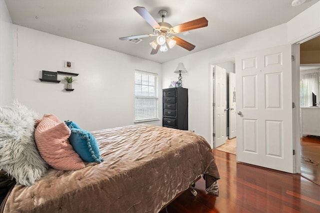 1204 NW 190th Pl, Edmond, OK 73012 - bedroom with wood finished floors and ceiling fan