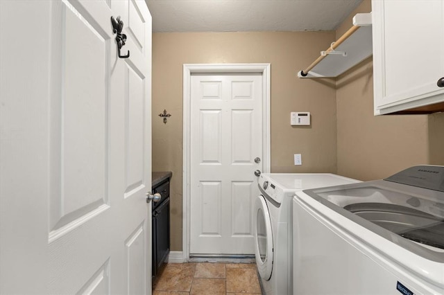 1204 NW 190th Pl, Edmond, OK 73012 - washroom featuring cabinet space and washing machine and clothes dryer