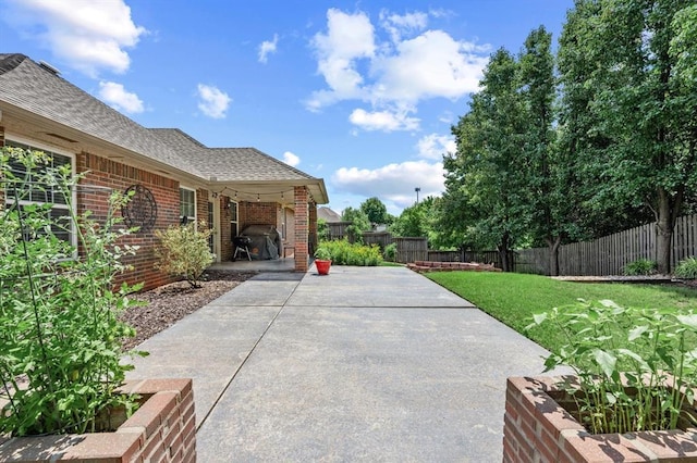 1204 NW 190th Pl, Edmond, OK 73012 - fenced backyard featuring a patio