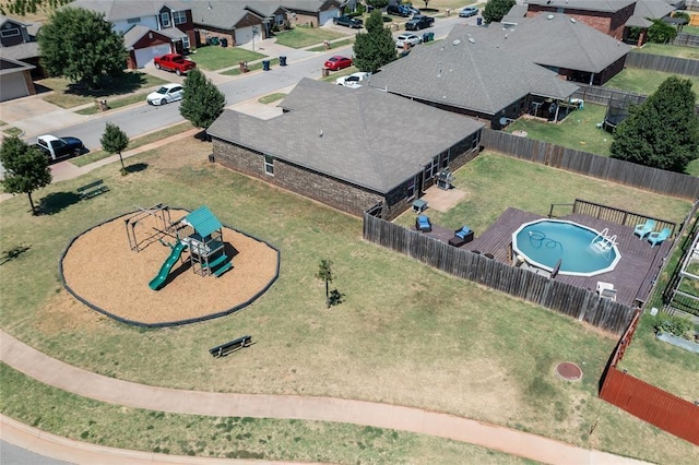 11516 SW 24th St, Yukon, OK 73099 - aerial view of residential area featuring a pool area
