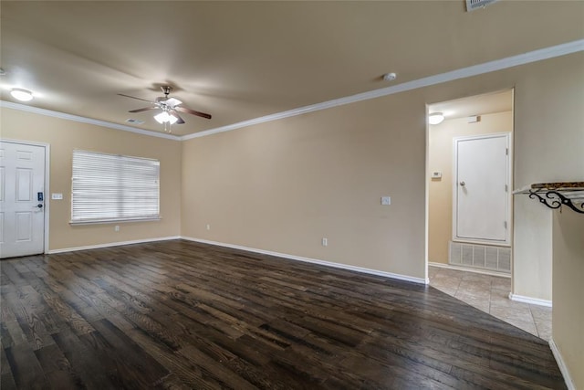 11516 SW 24th St, Yukon, OK 73099 - unfurnished living room with a ceiling fan, wood finished floors, and ornamental molding