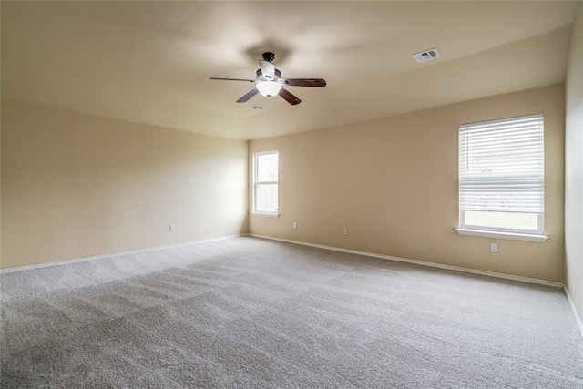 11516 SW 24th St, Yukon, OK 73099 - carpeted empty room featuring ceiling fan and baseboards