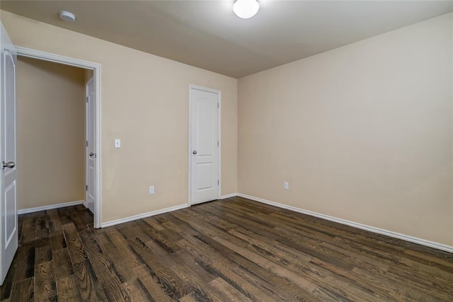 11516 SW 24th St, Yukon, OK 73099 - unfurnished bedroom with dark wood finished floors
