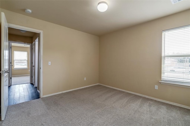 11516 SW 24th St, Yukon, OK 73099 - carpeted spare room with a smoke detector and baseboards