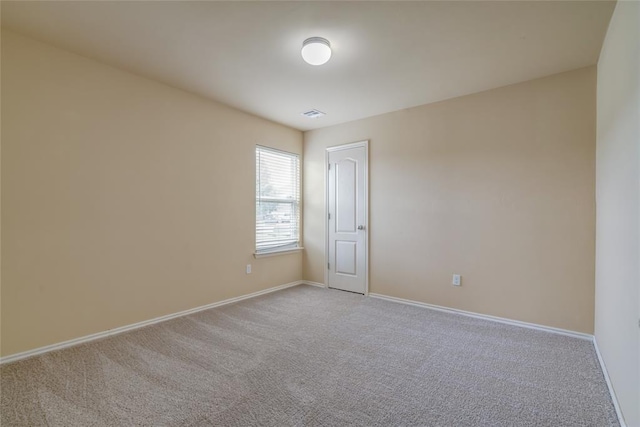 11516 SW 24th St, Yukon, OK 73099 - spare room with light carpet