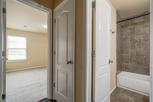 11516 SW 24th St, Yukon, OK 73099 - full bathroom with bathtub / shower combination and baseboards