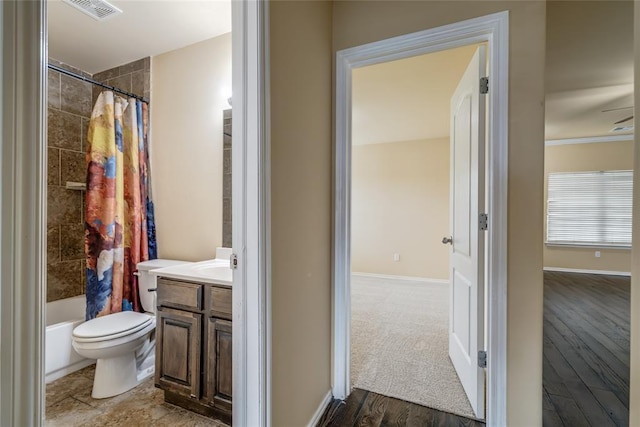 11516 SW 24th St, Yukon, OK 73099 - bathroom featuring vanity, shower / bathtub combination with curtain, wood finished floors, and crown molding