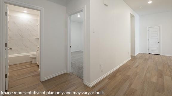 10200 NW 28th Ter, Yukon, OK 73099 - hall with wood finished floors and recessed lighting