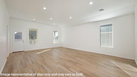 10200 NW 28th Ter, Yukon, OK 73099 - unfurnished room with light wood-style flooring and recessed lighting