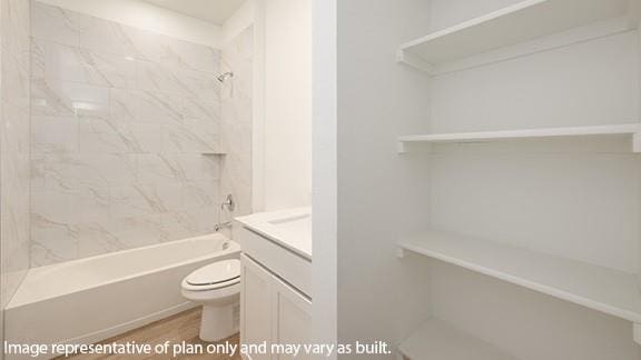 10200 NW 28th Ter, Yukon, OK 73099 - full bathroom featuring vanity, shower / tub combination, and wood finished floors