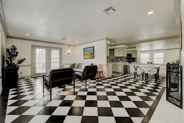 4400 Hemingway Dr Unit 259, Oklahoma City, OK 73118 - living area with plenty of natural light, ornamental molding, and recessed lighting