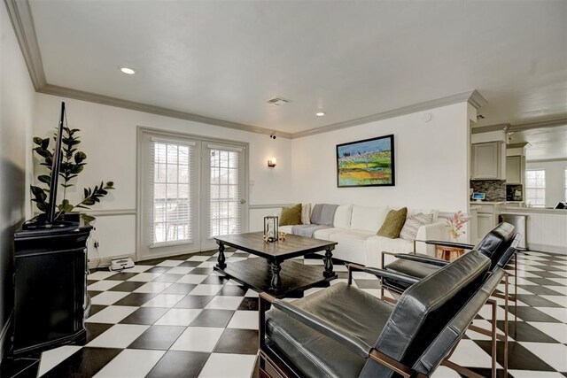 4400 Hemingway Dr Unit 259, Oklahoma City, OK 73118 - living room with tile patterned floors, ornamental molding, and recessed lighting