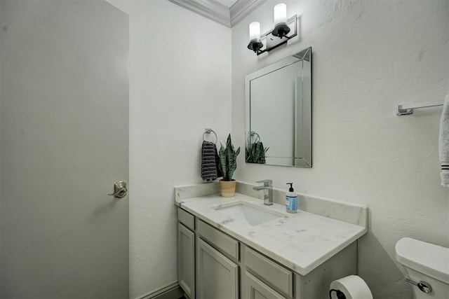 4400 Hemingway Dr Unit 259, Oklahoma City, OK 73118 - half bathroom with vanity and crown molding