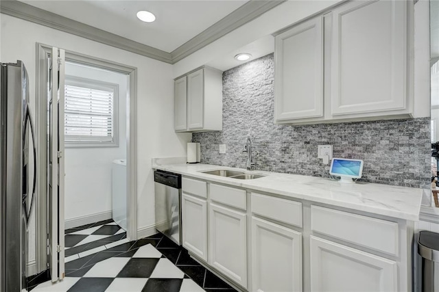 4400 Hemingway Dr Unit 259, Oklahoma City, OK 73118 - kitchen featuring stainless steel appliances, tasteful backsplash, ornamental molding, white cabinets, and light stone counters