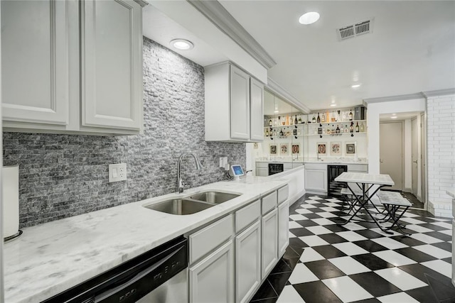 4400 Hemingway Dr Unit 259, Oklahoma City, OK 73118 - kitchen with dishwasher, tasteful backsplash, wine cooler, white cabinetry, and light stone countertops