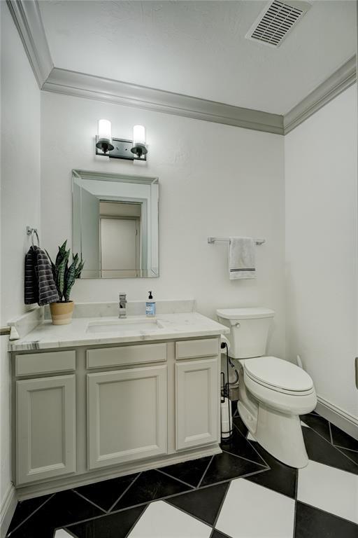 4400 Hemingway Dr Unit 259, Oklahoma City, OK 73118 - bathroom featuring vanity and ornamental molding