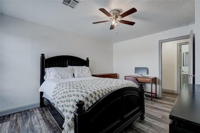 4400 Hemingway Dr Unit 259, Oklahoma City, OK 73118 - bedroom featuring wood finished floors and ceiling fan