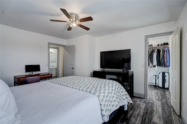 4400 Hemingway Dr Unit 259, Oklahoma City, OK 73118 - bedroom featuring dark wood-type flooring, a spacious closet, ceiling fan, a closet, and radiator