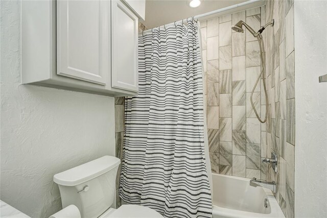 4400 Hemingway Dr Unit 259, Oklahoma City, OK 73118 - full bathroom with shower / bath combo and a textured wall