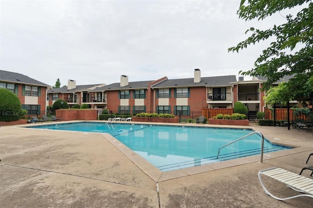 4400 Hemingway Dr Unit 259, Oklahoma City, OK 73118 - community pool with a patio and a residential view