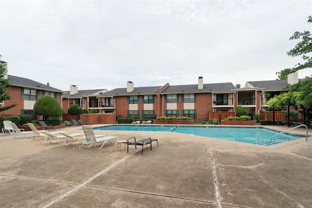 4400 Hemingway Dr Unit 259, Oklahoma City, OK 73118 - community pool with a patio area and a residential view