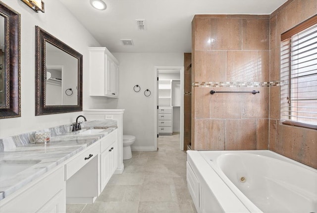 541 SW 154th Ct, Oklahoma City, OK 73170 - full bath featuring double vanity, a tub with jets, healthy amount of natural light, and recessed lighting