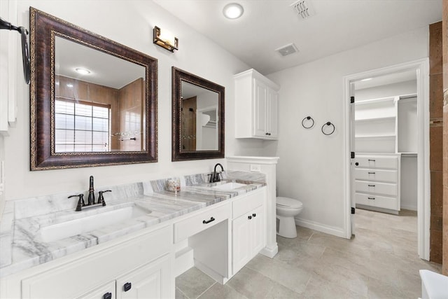 541 SW 154th Ct, Oklahoma City, OK 73170 - full bathroom with double vanity and a spacious closet