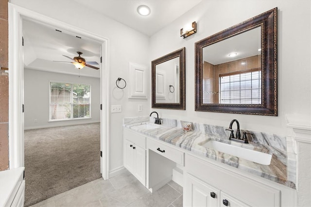 541 SW 154th Ct, Oklahoma City, OK 73170 - bathroom featuring double vanity, a ceiling fan, and tile patterned flooring