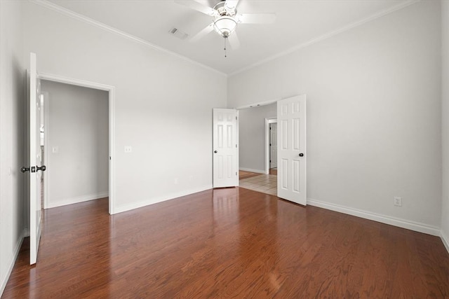 541 SW 154th Ct, Oklahoma City, OK 73170 - unfurnished bedroom featuring wood finished floors, ornamental molding, and ceiling fan