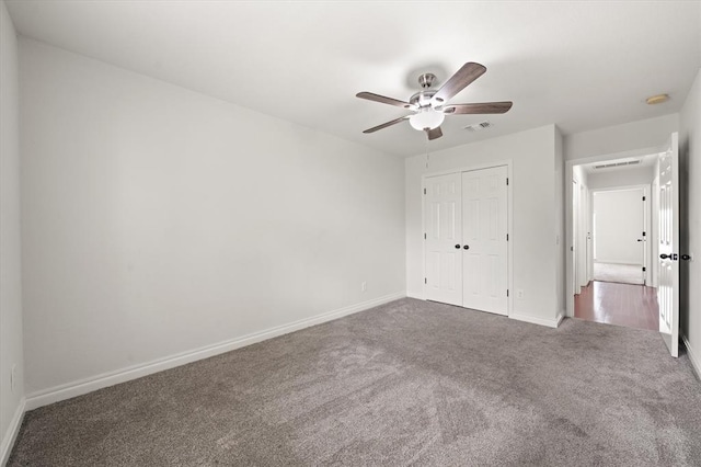 541 SW 154th Ct, Oklahoma City, OK 73170 - unfurnished bedroom with carpet flooring, a closet, and ceiling fan