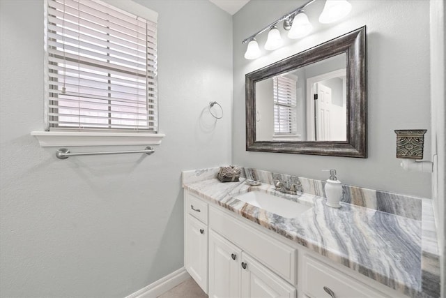 541 SW 154th Ct, Oklahoma City, OK 73170 - bathroom with vanity and baseboards