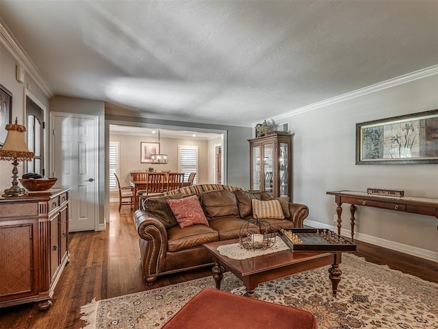 1718 Guilford Ln, Oklahoma City, OK 73120 - living area featuring dark wood-type flooring and crown molding