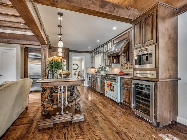 1718 Guilford Ln, Oklahoma City, OK 73120 - kitchen with beverage cooler, high end appliances, dark wood-type flooring, beamed ceiling, and exhaust hood