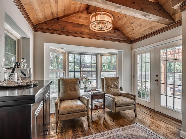1718 Guilford Ln, Oklahoma City, OK 73120 - living area featuring vaulted ceiling, wooden ceiling, wood-type flooring, ornamental molding, and french doors