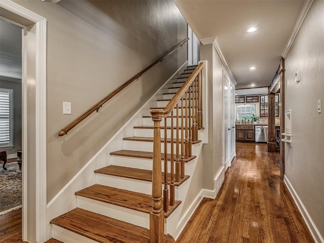 1718 Guilford Ln, Oklahoma City, OK 73120 - staircase with wood finished floors, recessed lighting, and ornamental molding