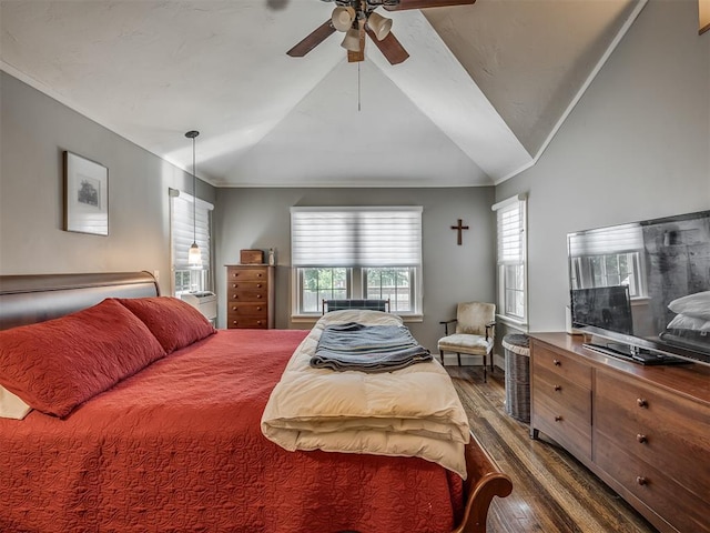 1718 Guilford Ln, Oklahoma City, OK 73120 - bedroom with wood finished floors, lofted ceiling, a ceiling fan, and crown molding