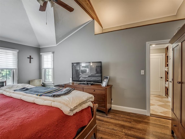 1718 Guilford Ln, Oklahoma City, OK 73120 - bedroom with lofted ceiling, multiple windows, dark wood-style flooring, a ceiling fan, and crown molding