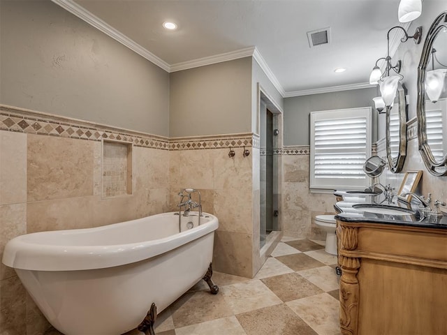 1718 Guilford Ln, Oklahoma City, OK 73120 - full bathroom featuring tile walls, vanity, a soaking tub, a stall shower, and ornamental molding