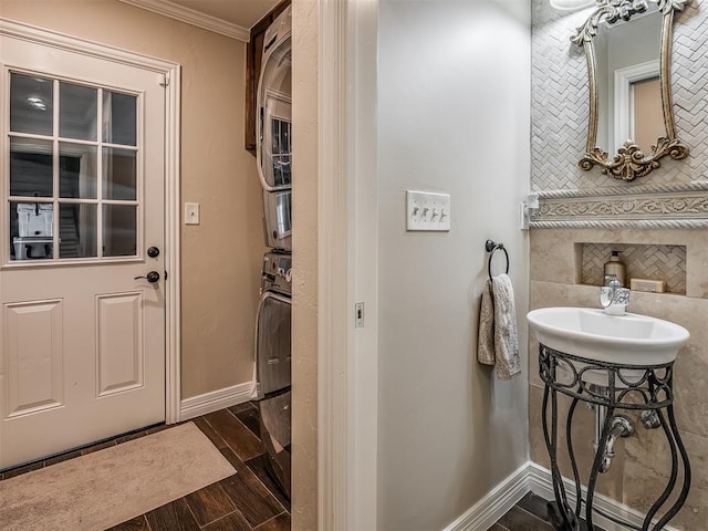 1718 Guilford Ln, Oklahoma City, OK 73120 - bathroom featuring wood finished floors, crown molding, and backsplash