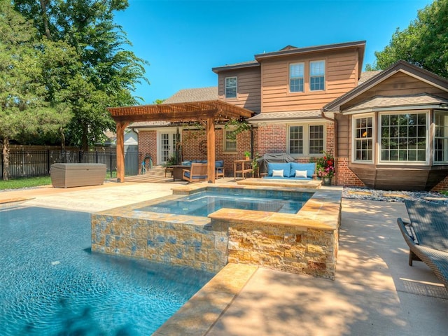 1718 Guilford Ln, Oklahoma City, OK 73120 - view of pool with a pergola, outdoor lounge area, a patio area, and a pool with connected hot tub
