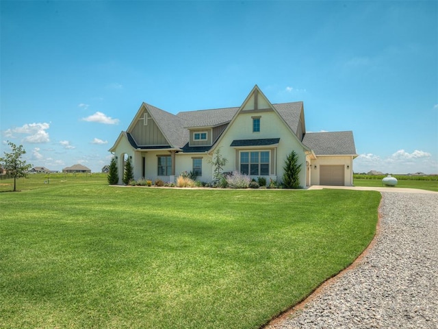 7290 NE Hawk Dr, Piedmont, OK 73078 - view of front of house featuring driveway, a garage, a front lawn, board and batten siding, and roof with shingles