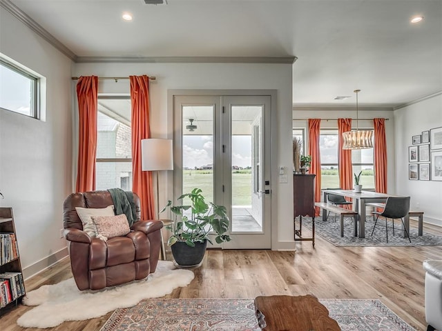 7290 NE Hawk Dr, Piedmont, OK 73078 - living area featuring ornamental molding, wood finished floors, and recessed lighting