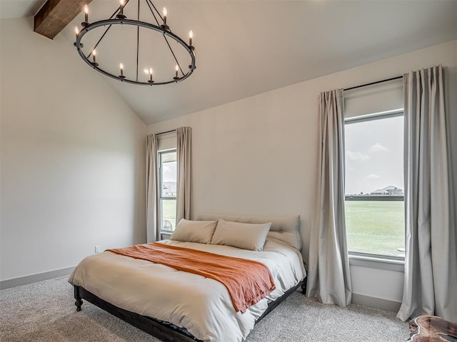 7290 NE Hawk Dr, Piedmont, OK 73078 - carpeted bedroom featuring a chandelier and multiple windows